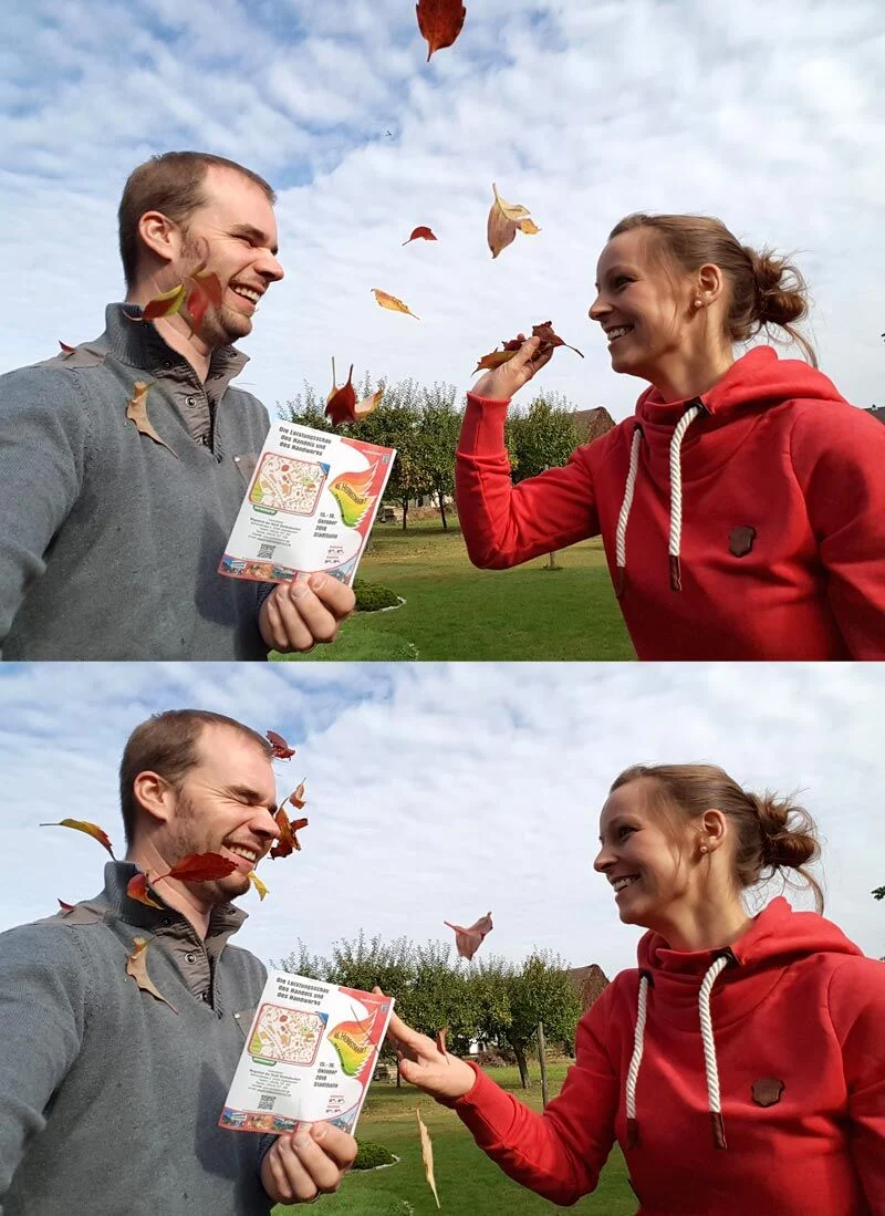 Herbstmarkt-Flyer | Peter Lauritis Photography Herbstmarkt Stadtallendorf 2016: zwei Personen mit Flyer und fliegendem Herbstlaub