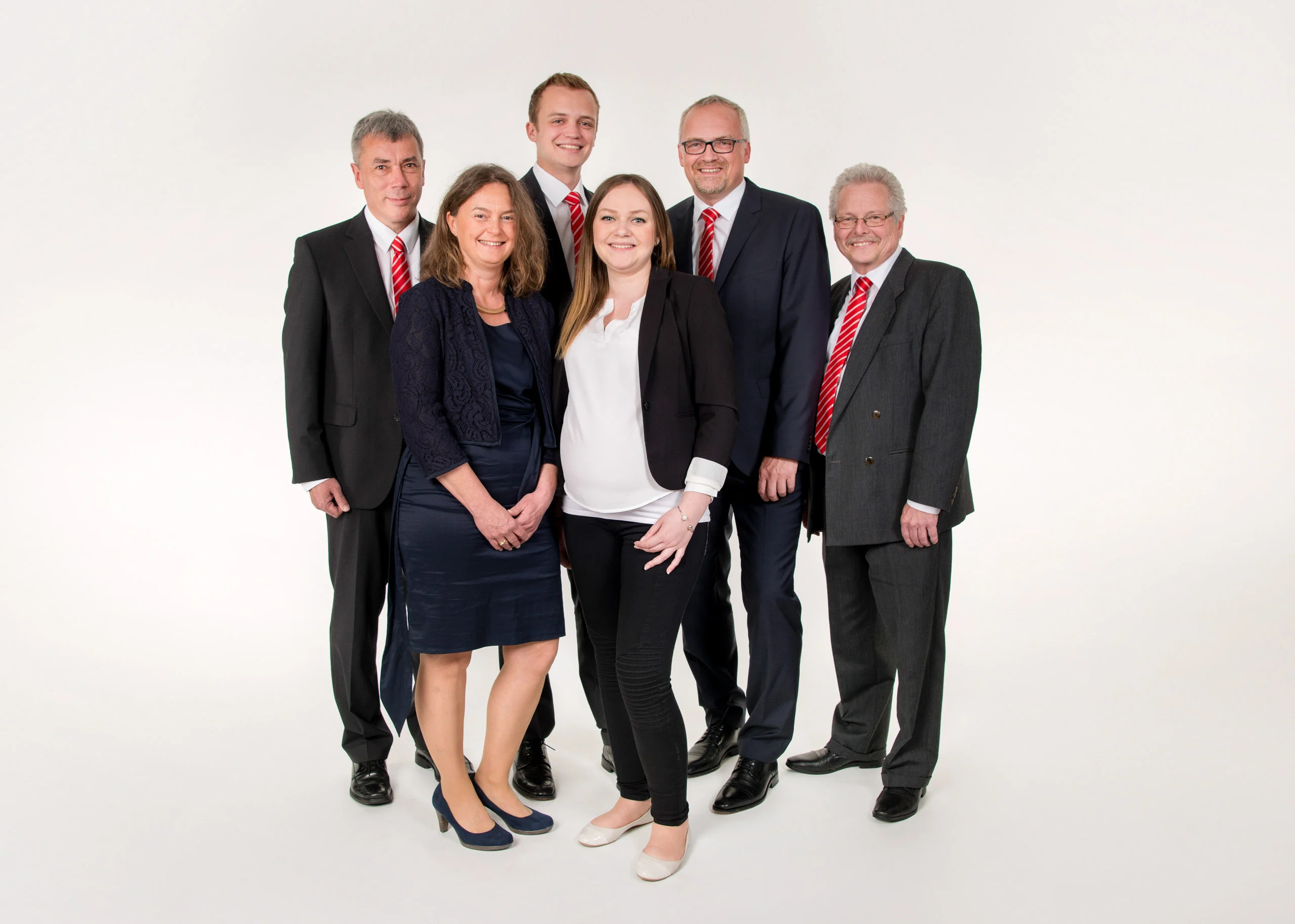 Business Portraits Fotogalerie 074 | Peter Lauritis Photography Teamfoto mit sechs Personen in Businesskleidung